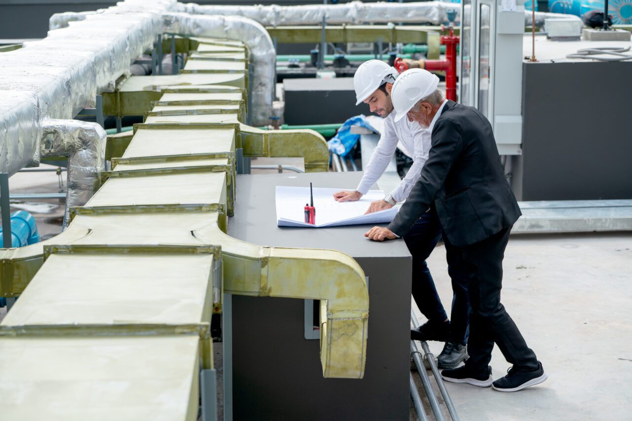 YOUNG and senior worker